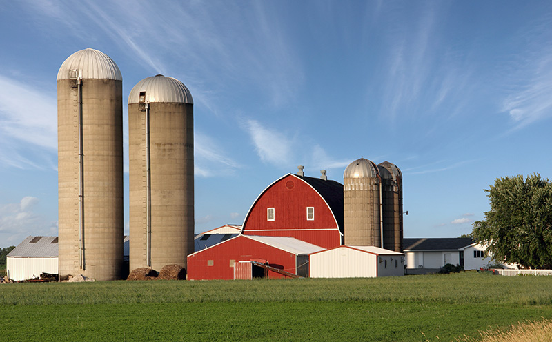 Rural farm scene with a dramatic sky