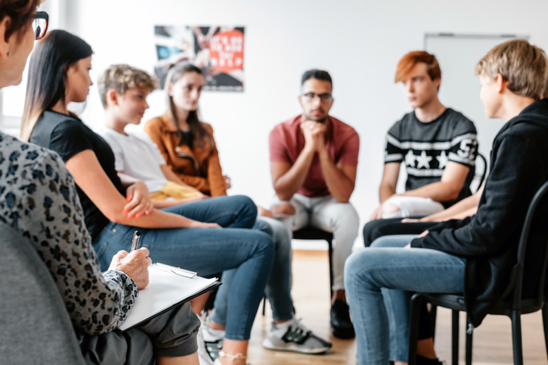 Teenagers at a community therapy group