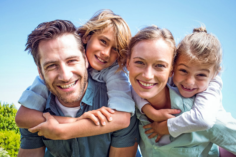 Happy parents with their children