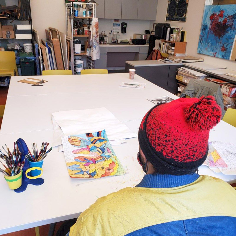 An ICL artist working in the studio at the East New York Health Hub