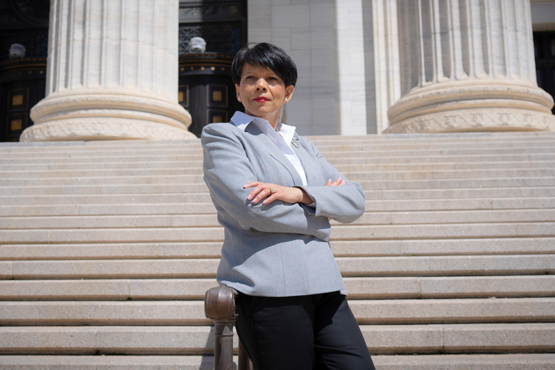 Carmen Collado, LCSW-R, on the steps of the New York State Department of Education. Copyright Darrell Camp 2026.