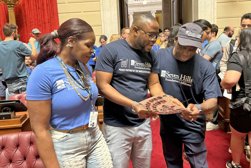 Dr. Adusu with his Team on the Floor of the Rhode island House of Representatives