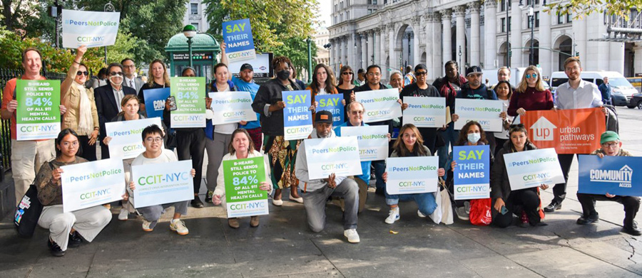 Members of CCIT-NYC rally at City Hall in support of adding peers to the city's B-HEARD crisis response teams.
